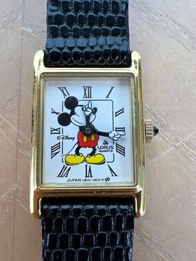 Disney Mickey Mouse Gold Tone Watch with Black Strap and Yellow/Red Accents